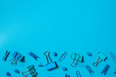 Directly above shot of artificial teeth against blue background