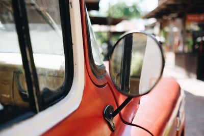 Close-up of reflection on side-view mirror