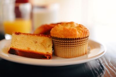 Close-up of fresh cakes in plate on table