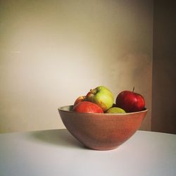 Close-up of fruits in bowl on table