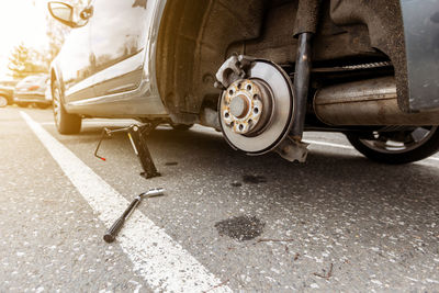 Close-up of car on street