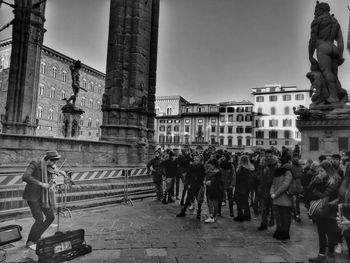 Group of people in front of historical building