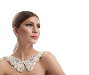 Portrait of a beautiful young woman over white background