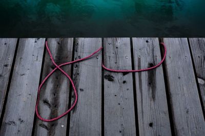 High angle view of wooden post on pier