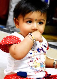 Close-up portrait of cute baby girl