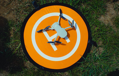 High angle view of bicycle sign on field