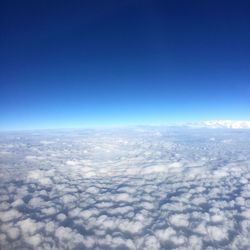 Aerial view of clouds against blue sky