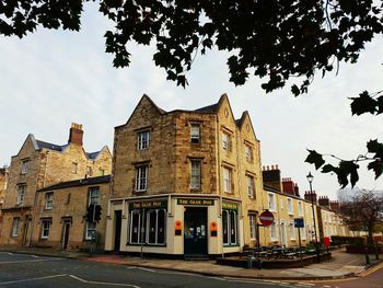 Low angle view of buildings against sky