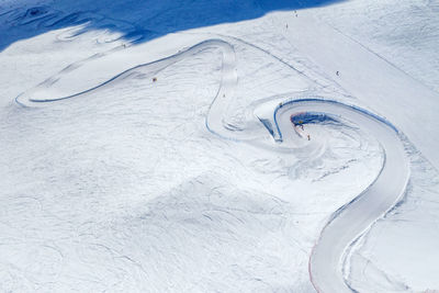 High angle view of snow covered land