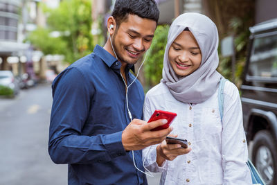 Young woman using mobile phone