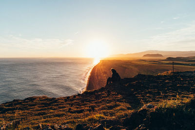 Scenic view of sea against sky during sunset