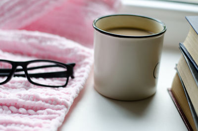 Close-up of coffee cup on table