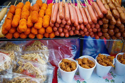 Variety of food for sale at market stall