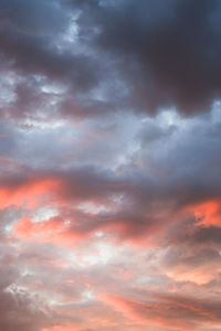 Low angle view of dramatic sky during sunset