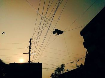 Low angle view of electricity pylon