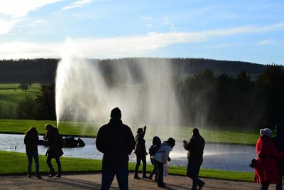 People enjoying fountain