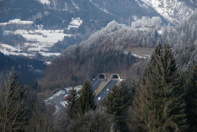 High angle view of road amidst trees and mountains