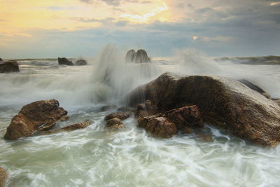 Scenic view of sea against sky during sunset