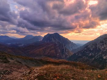 Scenic view of mountains against sky during sunset