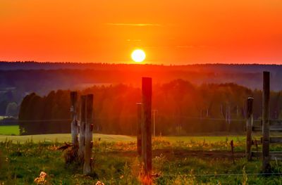 Scenic view of landscape at sunset