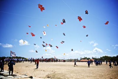 People gathered on beach for kite festival