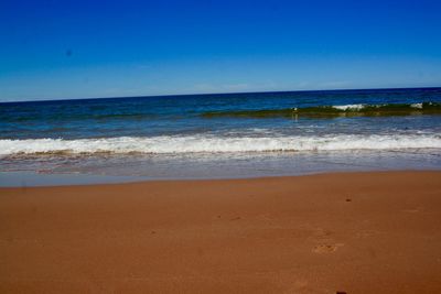 Scenic view of sea against clear sky
