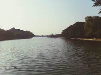 View of calm lake against clear sky