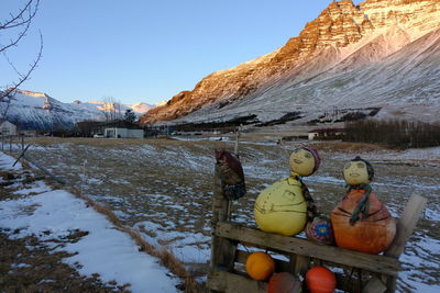 Scenic view of snowcapped mountains against clear sky