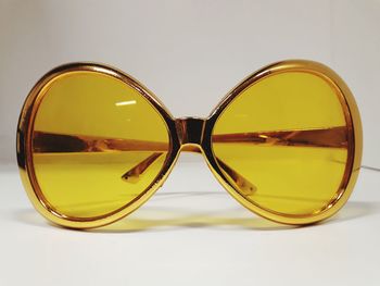 Close-up of sunglasses on table