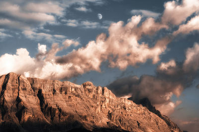 Low angle view of rock formations against sky