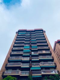 Low angle view of building roof against sky