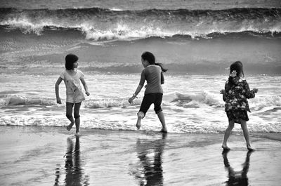 People enjoying at beach