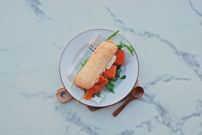 High angle view of fish in plate on table