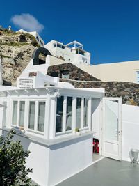 Low angle view of building against clear blue sky at oia, santorini