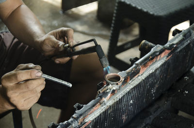 Man working on metal structure