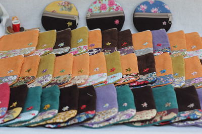 Close-up of multi colored objects for sale in market