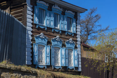 Low angle view of building against blue sky