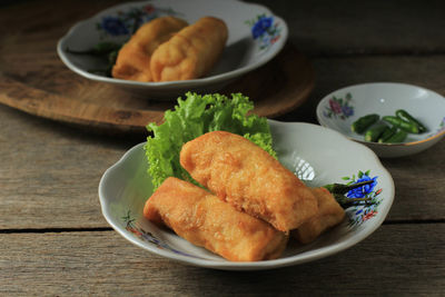 Selected focus sosis solo or fried egg crepe with minced beef or chicken filling. 