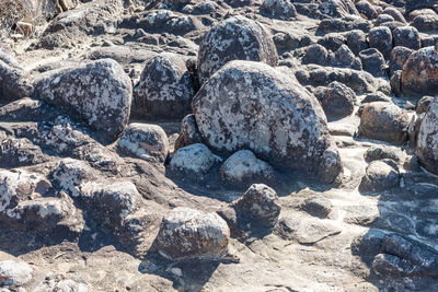 Close-up of pebbles on beach