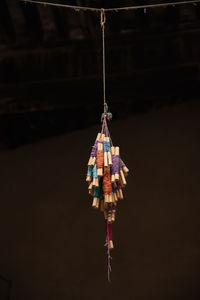 Low angle view of decoration hanging on rope