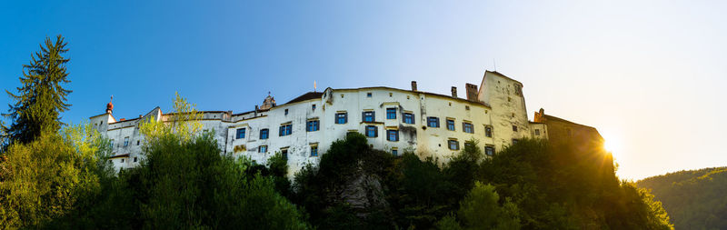 Low angle view of buildings against clear sky