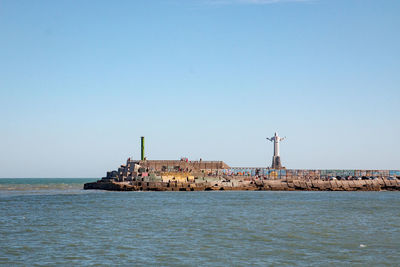 Scenic view of sea against clear sky