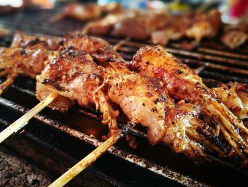 Close-up of meat on barbecue grill