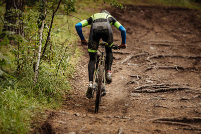 Rear view of bicycle on field