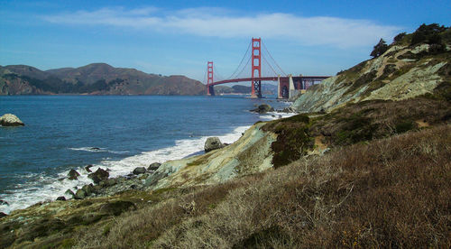 View of suspension bridge over sea