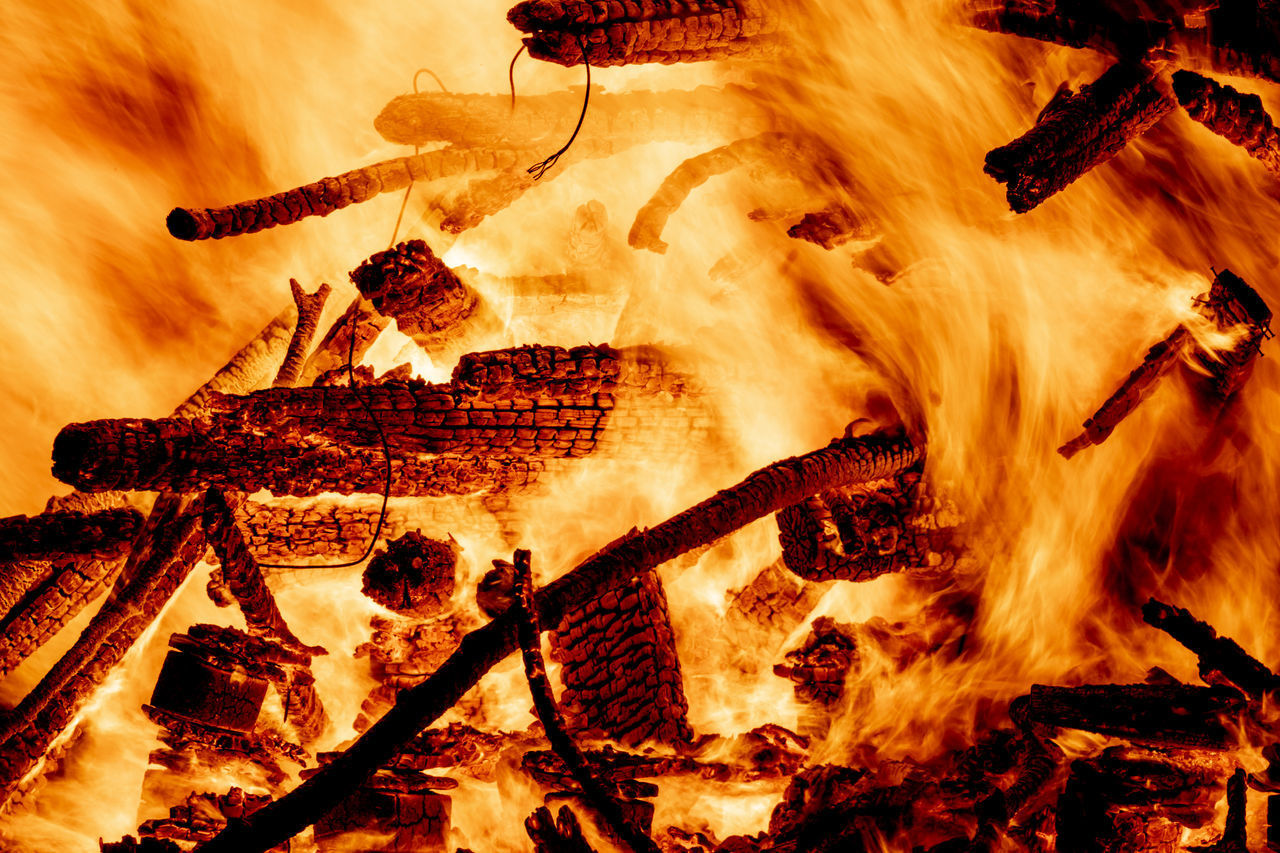 CLOSE-UP OF BONFIRE WITH FIRE CRACKERS