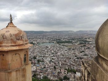 High angle view of townscape against sky in city