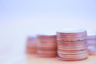 Close-up of coins on table