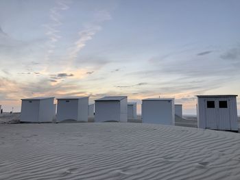 Scenic view of beach against sky during sunset