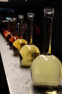 Close-up of wine glasses on table